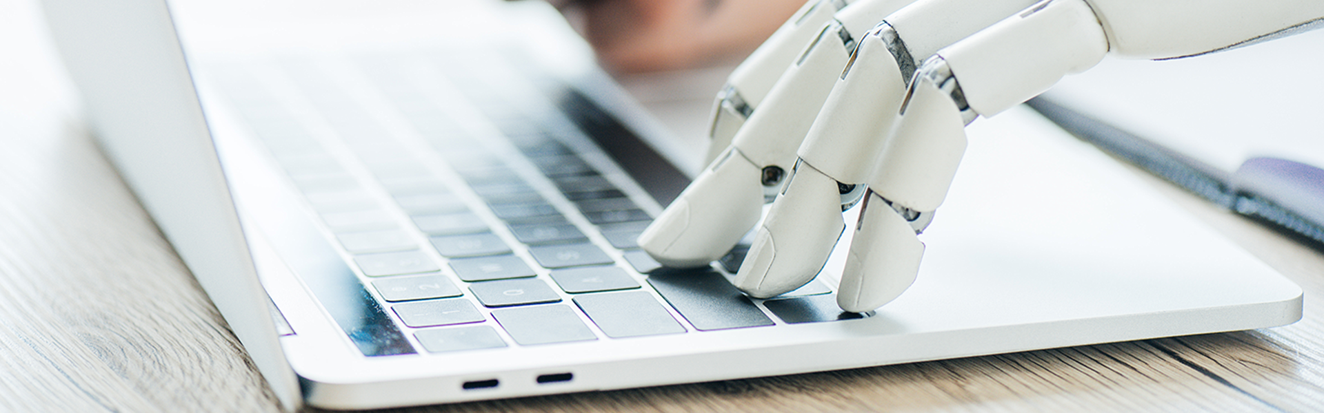 Robot And Human On Keyboard Heading